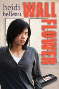 Book cover for Wallflower by Heidi Belleau. A slight Asian man with chin-length black air looks shyly at the camera while wearing a black v-neck cardigan over a white t-shirt.