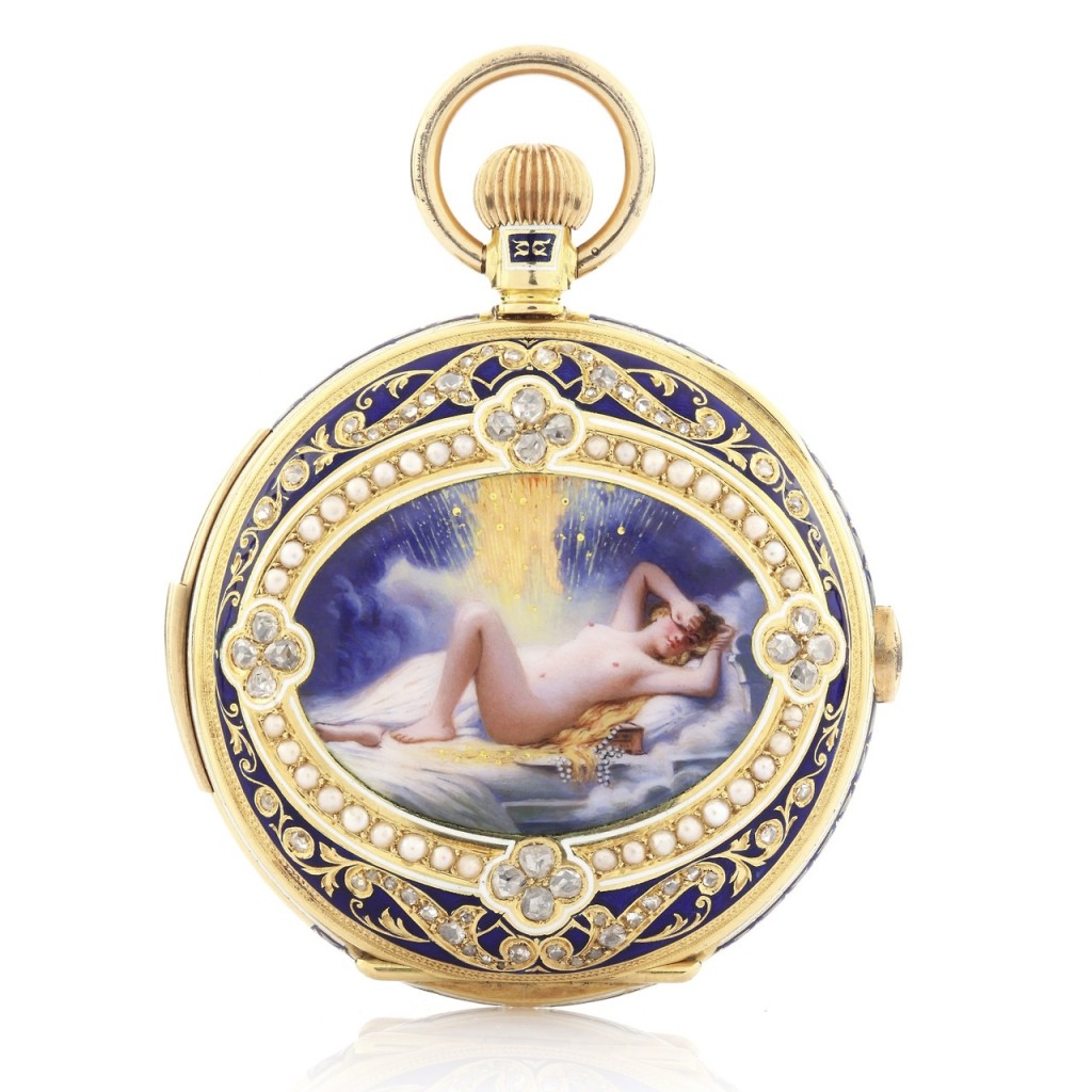 A gold pocket watch decorated with diamonds and sapphire with a painting of a nude woman in the center.