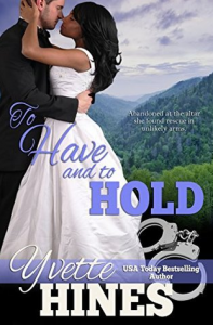 Book cover for To Have and To Hold by Yvette Hines. A black woman in a white wedding gown embraces a white man in a dark tux. The background is a landscape of tree-covered mountains and there's a pair of handcuffs in the title area.