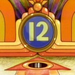 A still from a 1977 Sesame Street video. The number twelve shows in a round window over a pinball hole and is surrounded by bumpers in shades of orange.